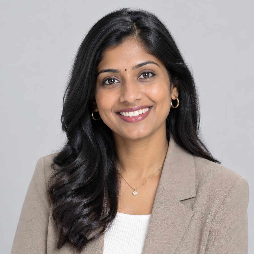 Studio portrait of a Malaysian Indian woman smiling