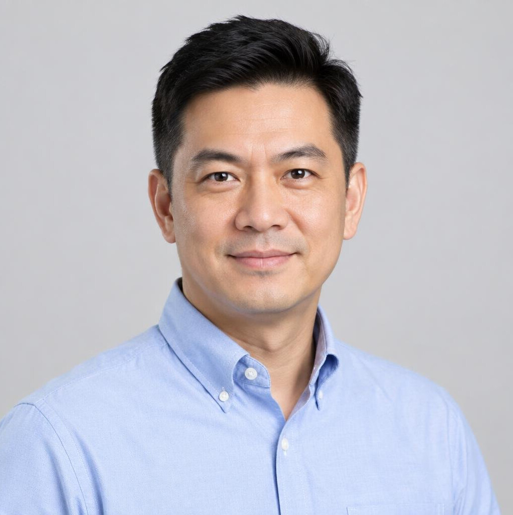 Studio portrait of a Malaysian Chinese man in business attire