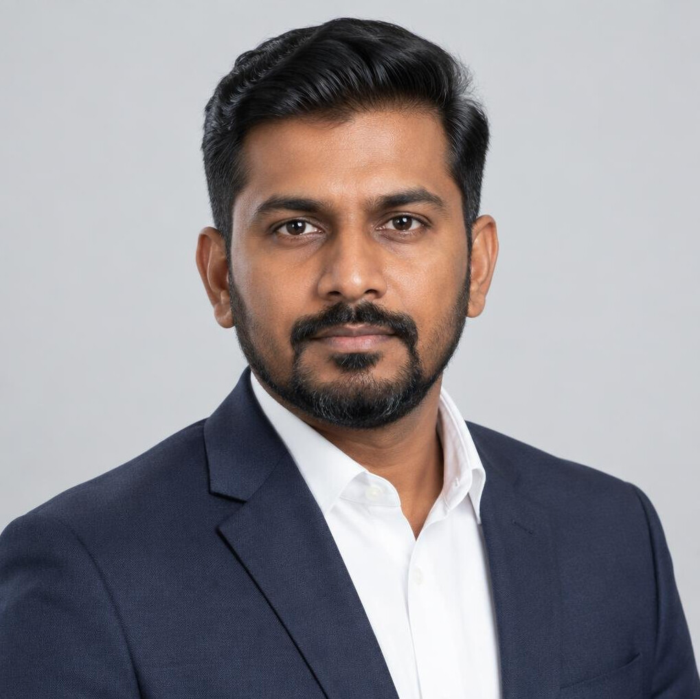 Studio portrait of a Malaysian Indian man in business attire