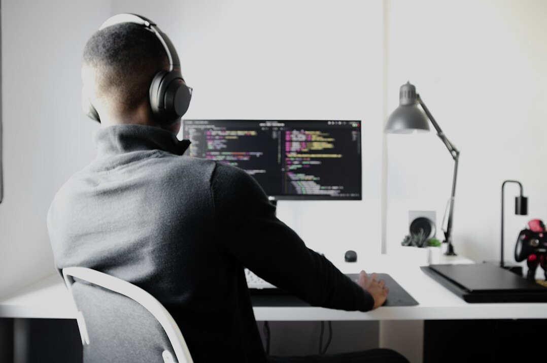 programmer writing insurance code